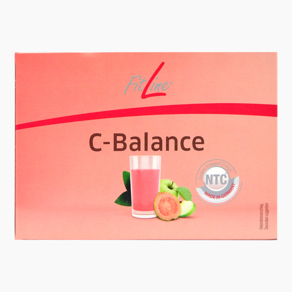 Rosa Produktverpackung FitLine C-Balance mit Aufdruck Glas rosa Flüssigkeit und Fruchtstücken