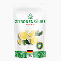 Thumbnail for Standbeutel mit Aufschrift Zitronensäure Greenfoxx 3 kg und Zitronenscheiben vor weißem Hintergrund