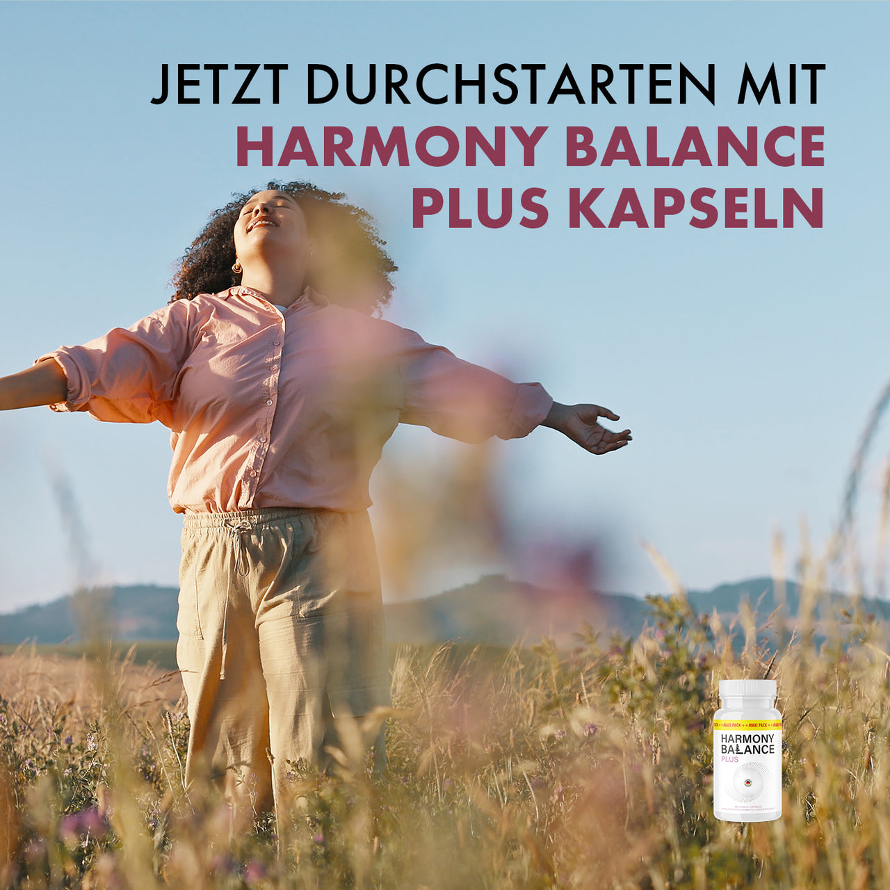 Woman stands with outstretched arms in a meadow with text: Get started now with Harmony Balance Plus