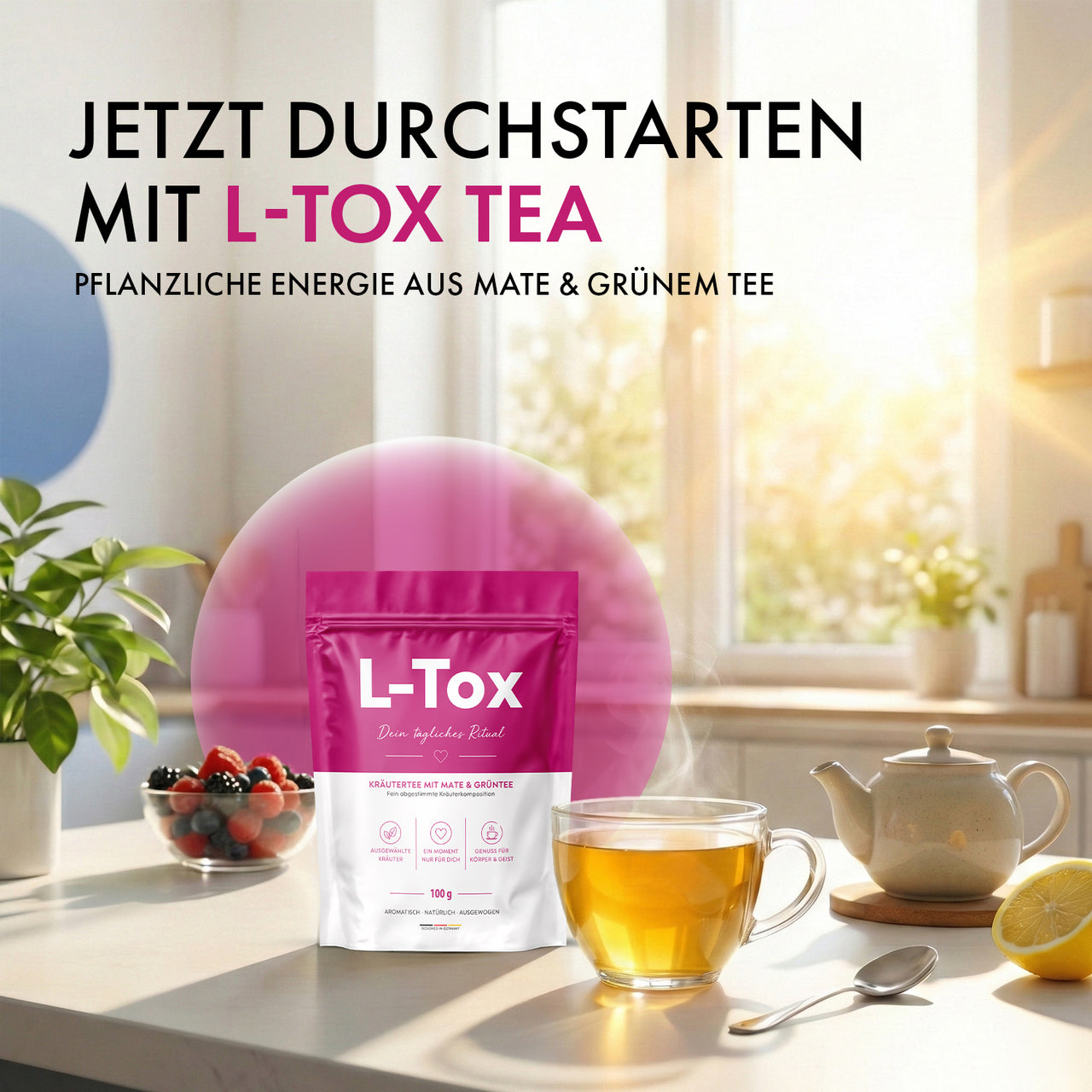 L-Tox Tea bag with teacup, teapot, berries and lemon on a light kitchen work surface