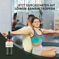 Thumbnail for Zwei Personen beim Training neben Löwen ABNHM Tropfen und dem Werbetext „Jetzt durchstarten“