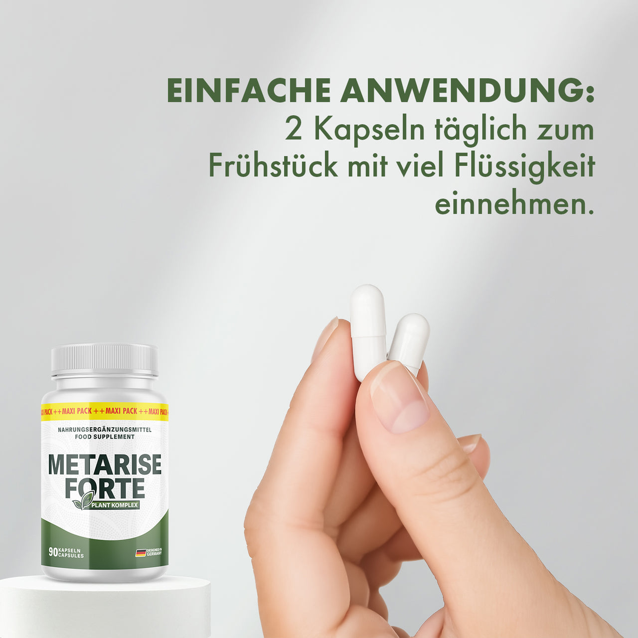 Hand holding two capsules, Metarise Forte and instructions for use.