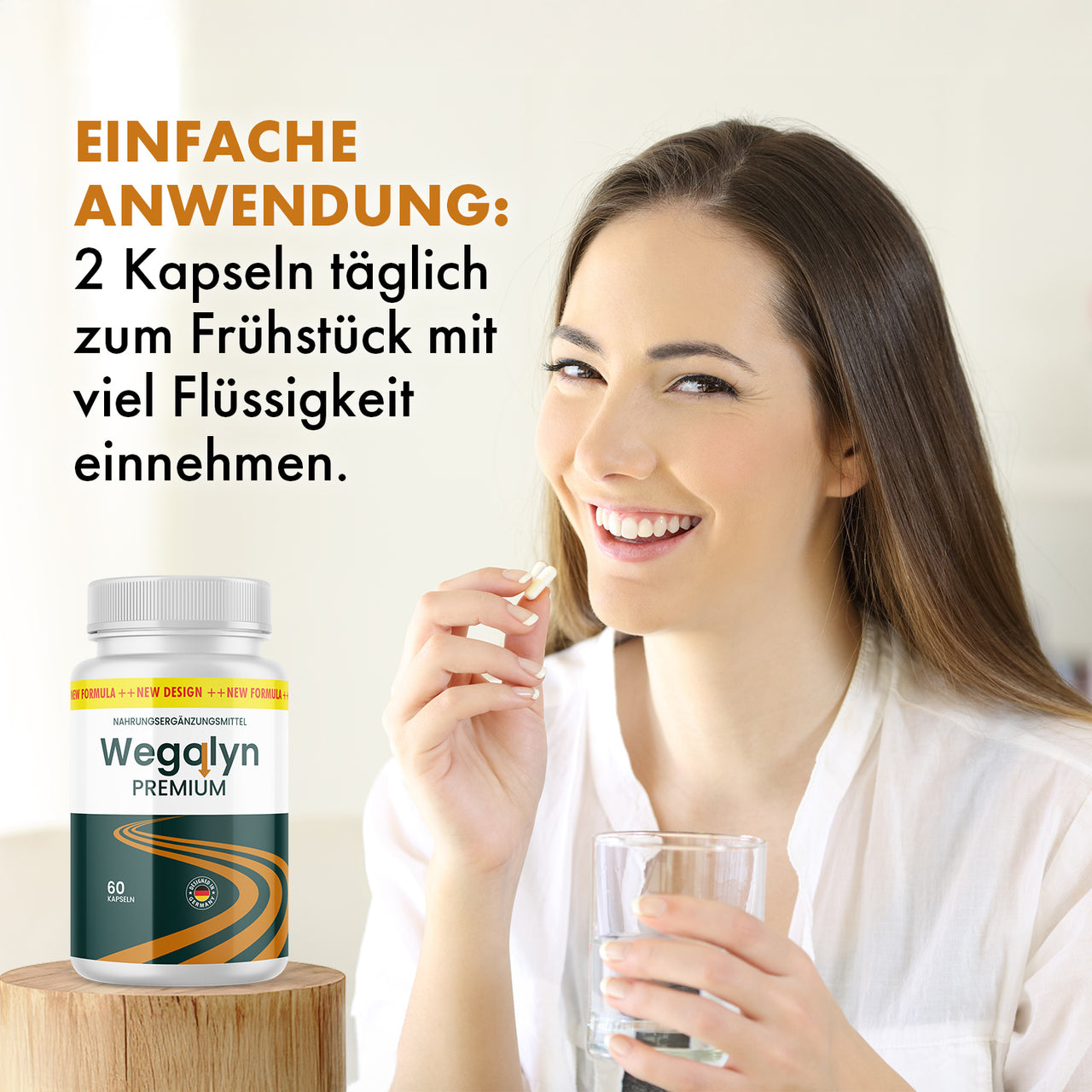 Person hält zwei Kapseln und ein Glas Wasser, daneben Wegolyn Premium mit dem Einnahmehinweis